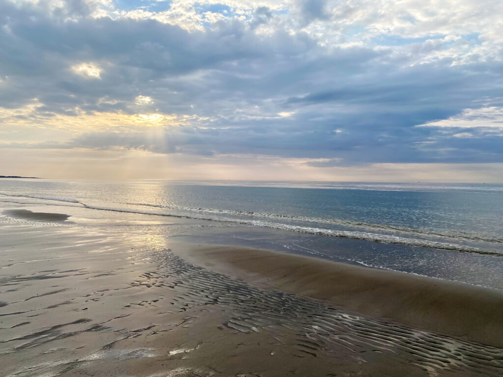 Noordzee sea with sun beams