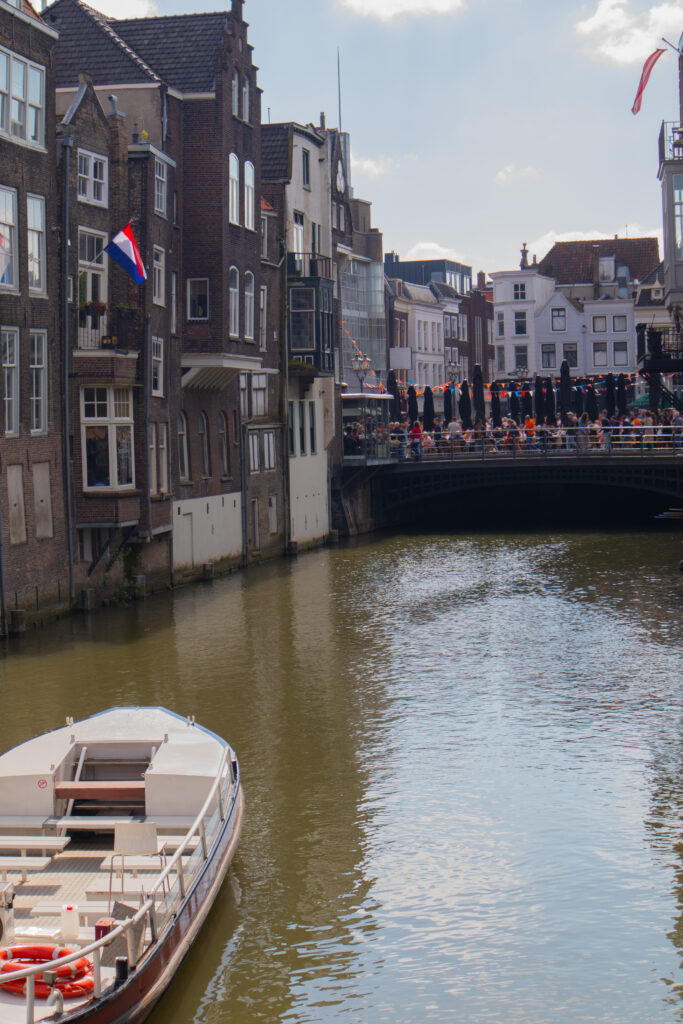 Boat in canal during Dutch King’s Day