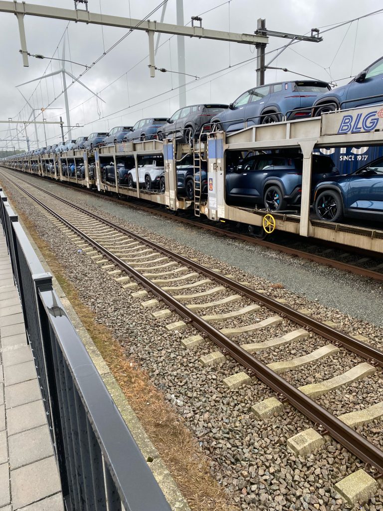 Electric Cars getting transported with train