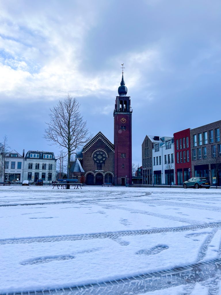 Snowy church in Zevenbergen