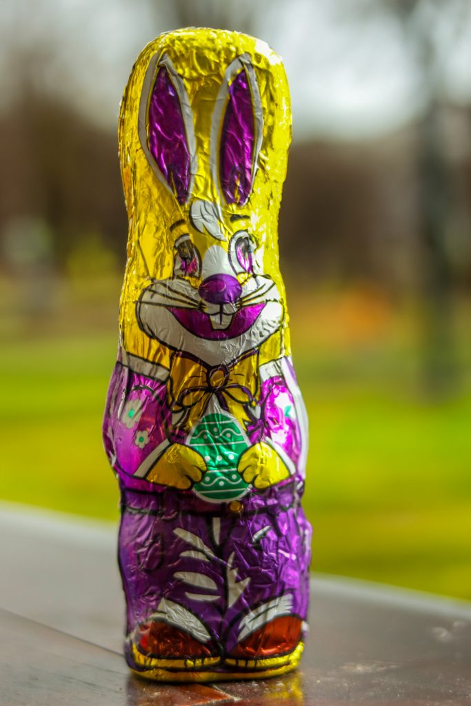 Chocolate easter bunny on a picnic table