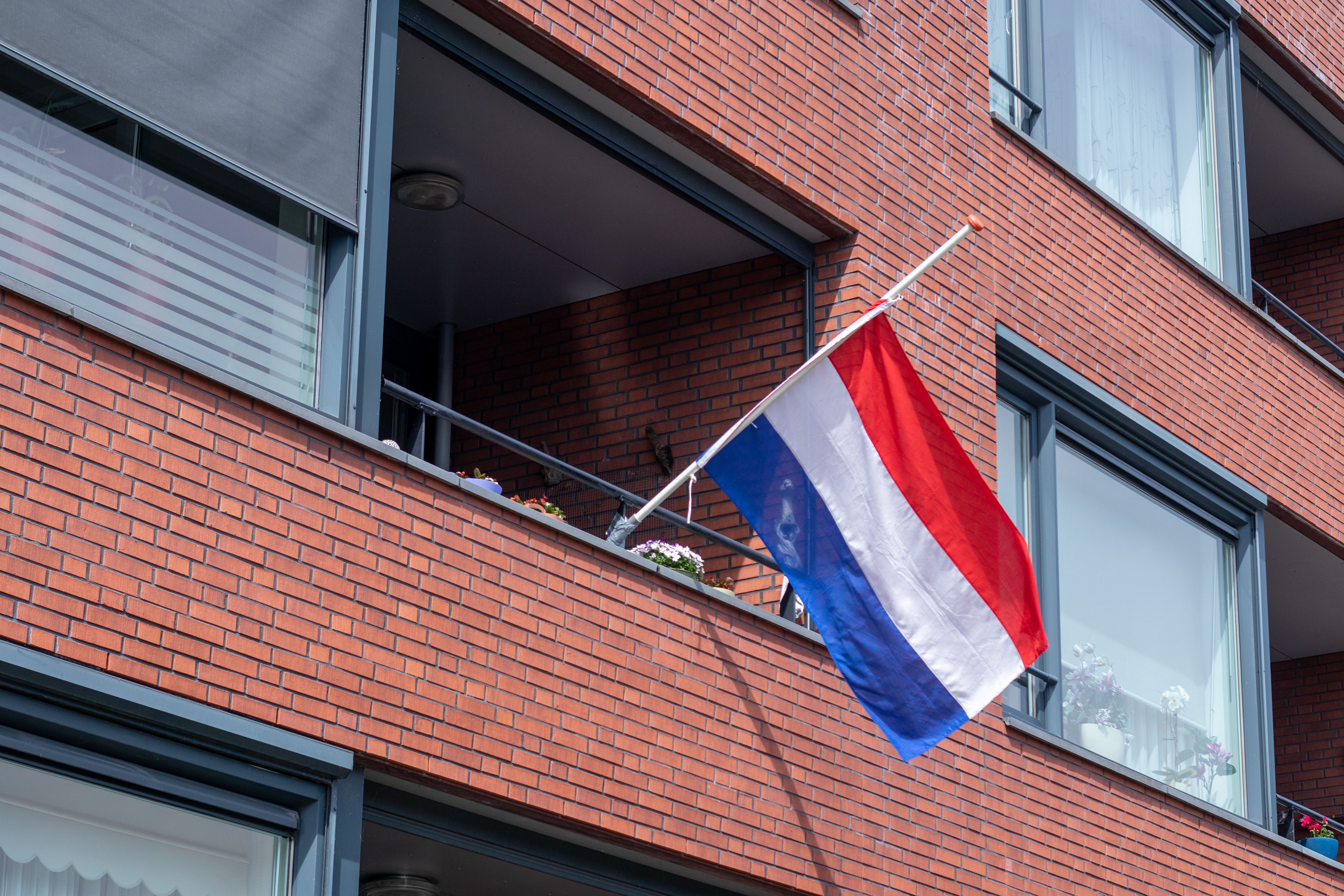 Dutch flag half-staff as a token of respect for the fallen soldiers of war
