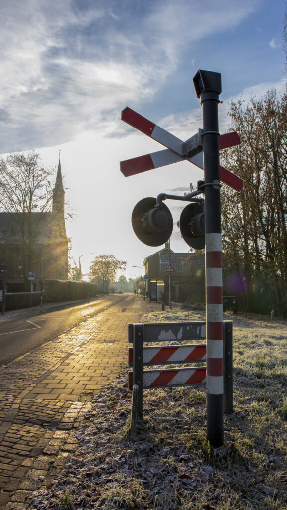 Railway crossing in winter morning
