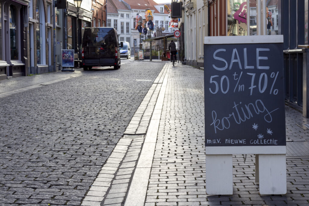 Shopping street with sales sign