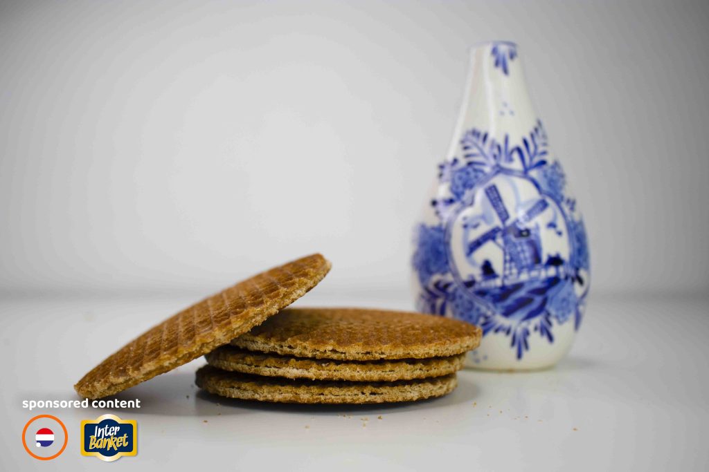Dutch stroopwafel stacked before a Delfts Blue vase