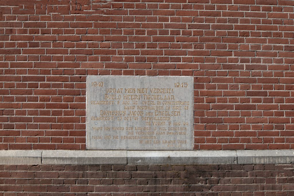 Memorial stone on a house of a heroic Dutch freedom fighter