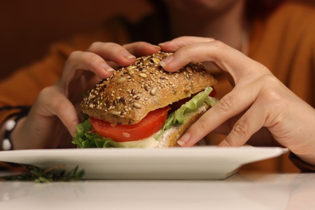 Girl eating sandwich